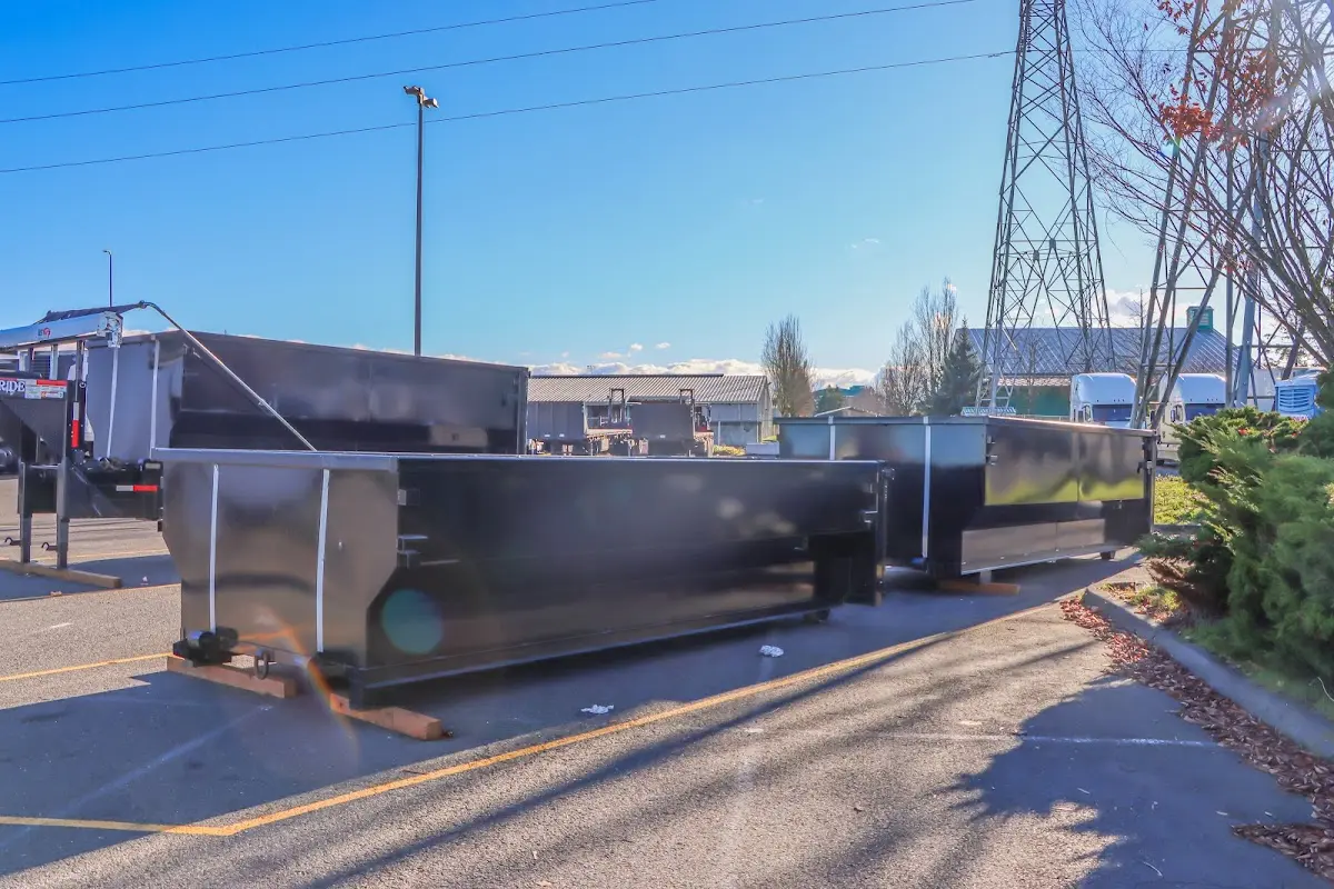 Roll-off dumpster ready for waste disposal at job site for 12 Yard Dumpster Rental in Willows